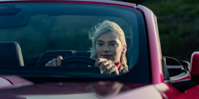 a girl driving Ford Mustang Mach-E 